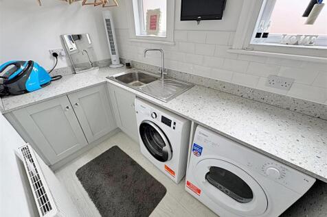 UPSTAIRS UTILITY ROOM