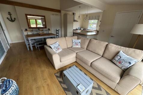 LIVING AREA, SITTING, DINING AND KITCHEN