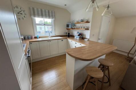 LIVING AREA, SITTING, DINING AND KITCHEN