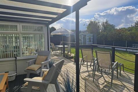 OUTSIDE COVERED SEATING AREA