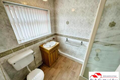 FULLY TILED SHOWER ROOM