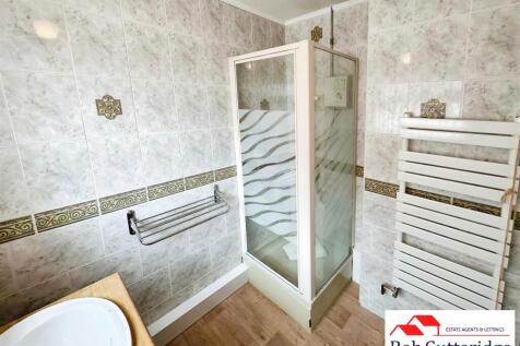 FULLY TILED SHOWER ROOM
