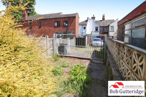 REAR YARD / OFF ROAD PARKING