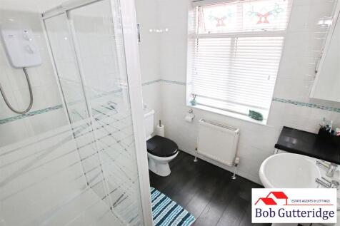 FIRST FLOOR FULLY TILED SHOWER ROOM