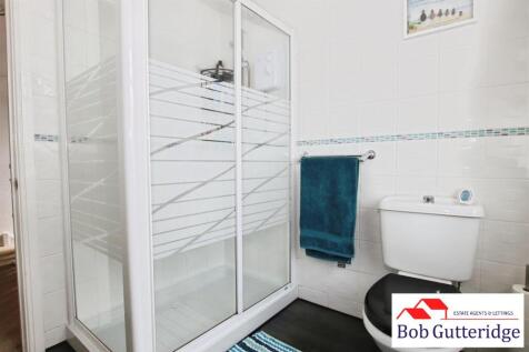 FIRST FLOOR FULLY TILED SHOWER ROOM
