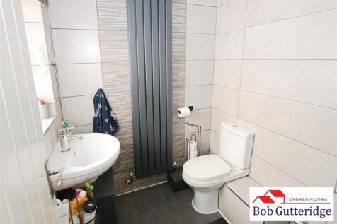 GROUND FLOOR FULLY TILED SHOWER ROOM