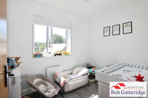 BEDROOM FIVE (REAR)