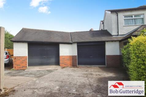 ATTACHED DOUBLE BRICK GARAGE
