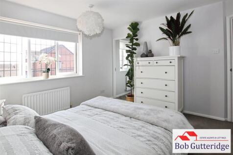 BEDROOM ONE (FRONT)