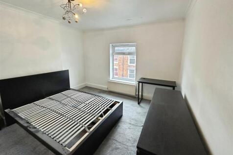 BEDROOM ONE (FRONT)