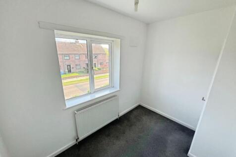 6ec6ca46-Bedroom 20Three.jpg