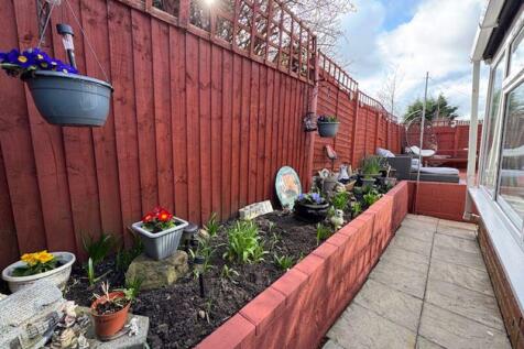 Retained soil beds