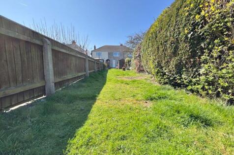 Rear garden and rear elevation