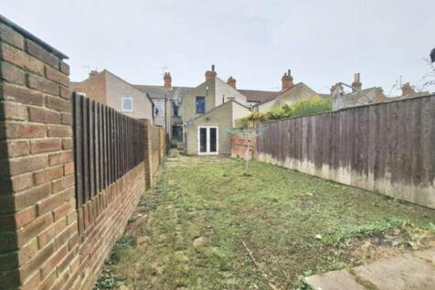Rear garden and elevation
