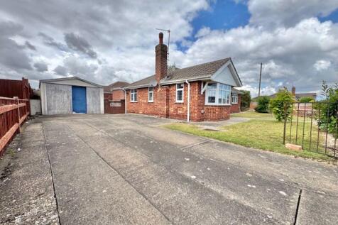 Driveway to garage and front 