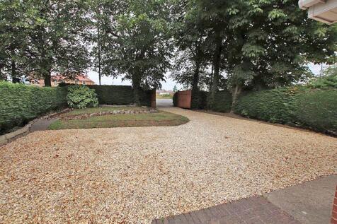 front garden with gated acess
