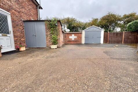 Driveway and garage view 2