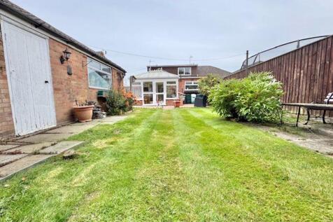 Rear garden and elevation