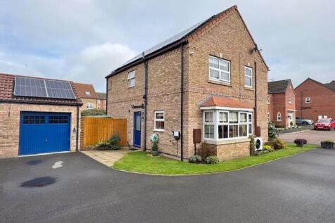 Garage, parking and rear of house