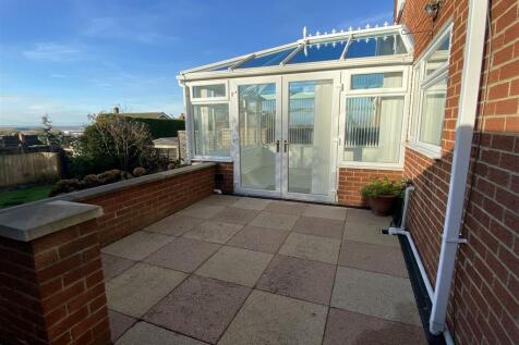 Extensive paved patio area