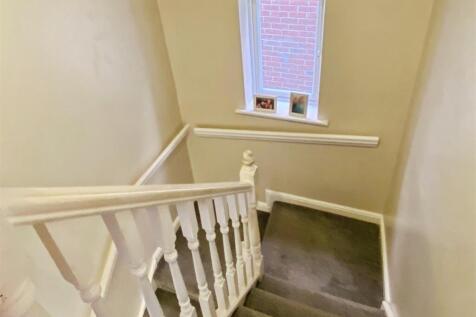 Stairs to first floor and landing