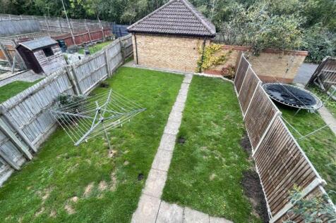 Rear Garden showing Garage