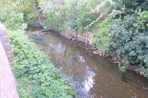 River Located End Of Communal Garden