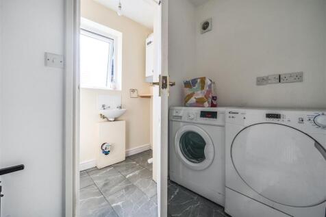 UTILITY ROOM AND W.C