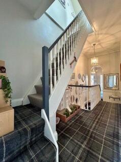 Staircase Rising To Second Floor