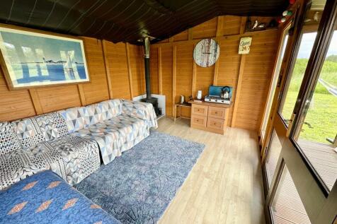 summer house interior with woodburner.JPEG