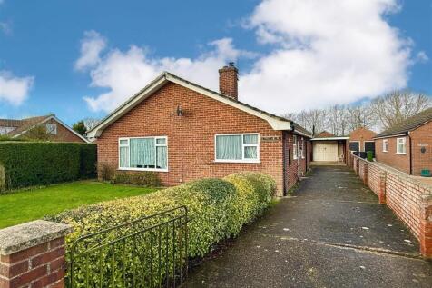 front aspect and driveway
