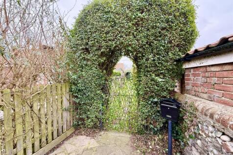 archway and gate from driveway