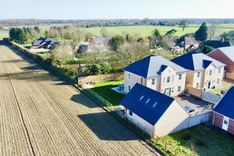 nicely lcated beside farmland