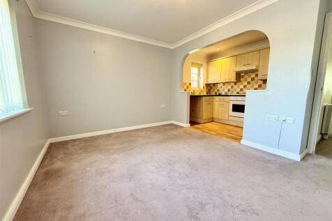 lounge with open plan kitchen