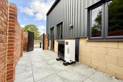 courtyard garden with air source heat pump