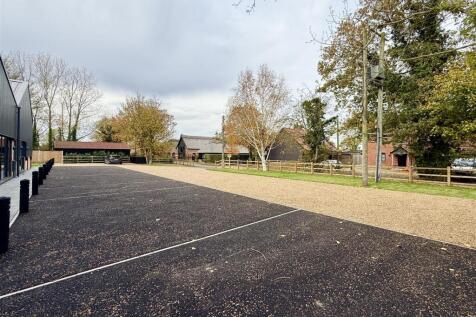 parking and communal grounds to front