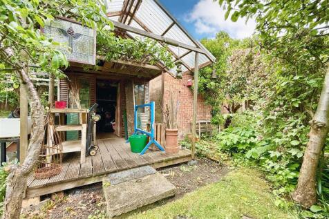 delightful garden workshop with veranda
