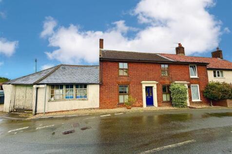 front aspect with garage to side