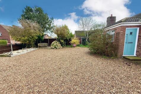 drive and garden to front