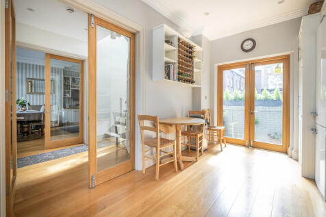 Bright Kitchen/Breakfast Room Opening to Private Patio
