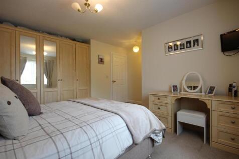 MASTER BEDROOM (front)