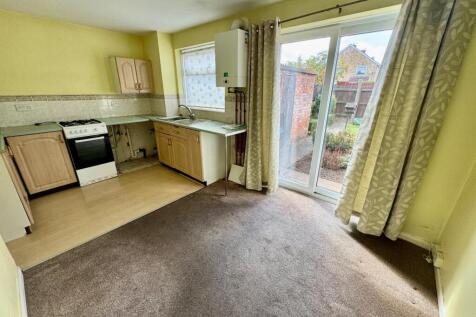 Dining Area into Kitchen