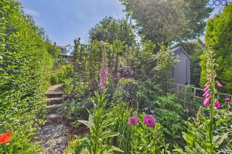 Beautiful Tiered Garden and Blooming Flowers