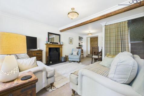 Living Room with open fire and room for dining