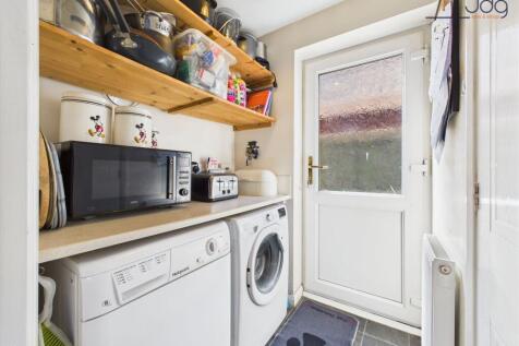 Utility space leading out to the back garden