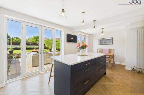 Open Plan Kitchen Diner with twin sets of French doors
