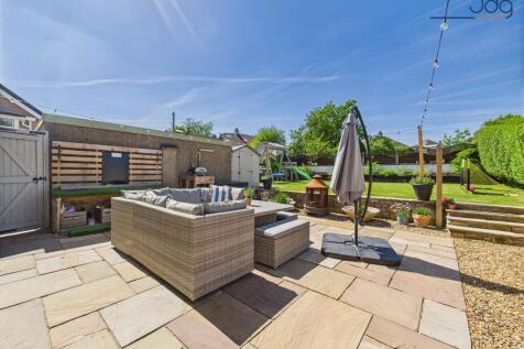 Landscaped rear garden with Indian stone patio