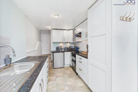 Modern shaker-style kitchen and Velux windows