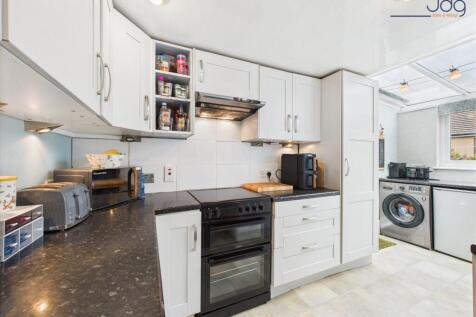 Modern shaker-style kitchen and Velux windows