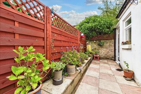 Larger than average yard and an attached outhouse/greenhouse